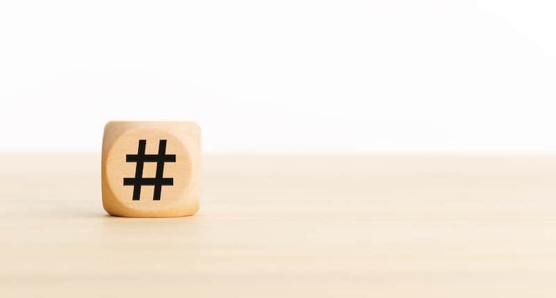 Hashtag symbol on wooden cube