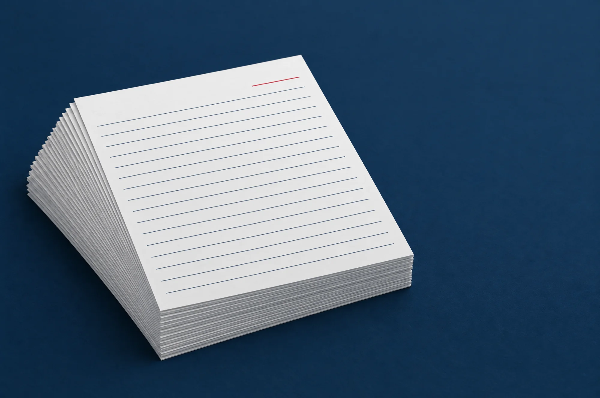 A deep stack of identical blank sheets, standing for the daily backup copies a maintenance plan makes and a website cannot get back once they are gone.